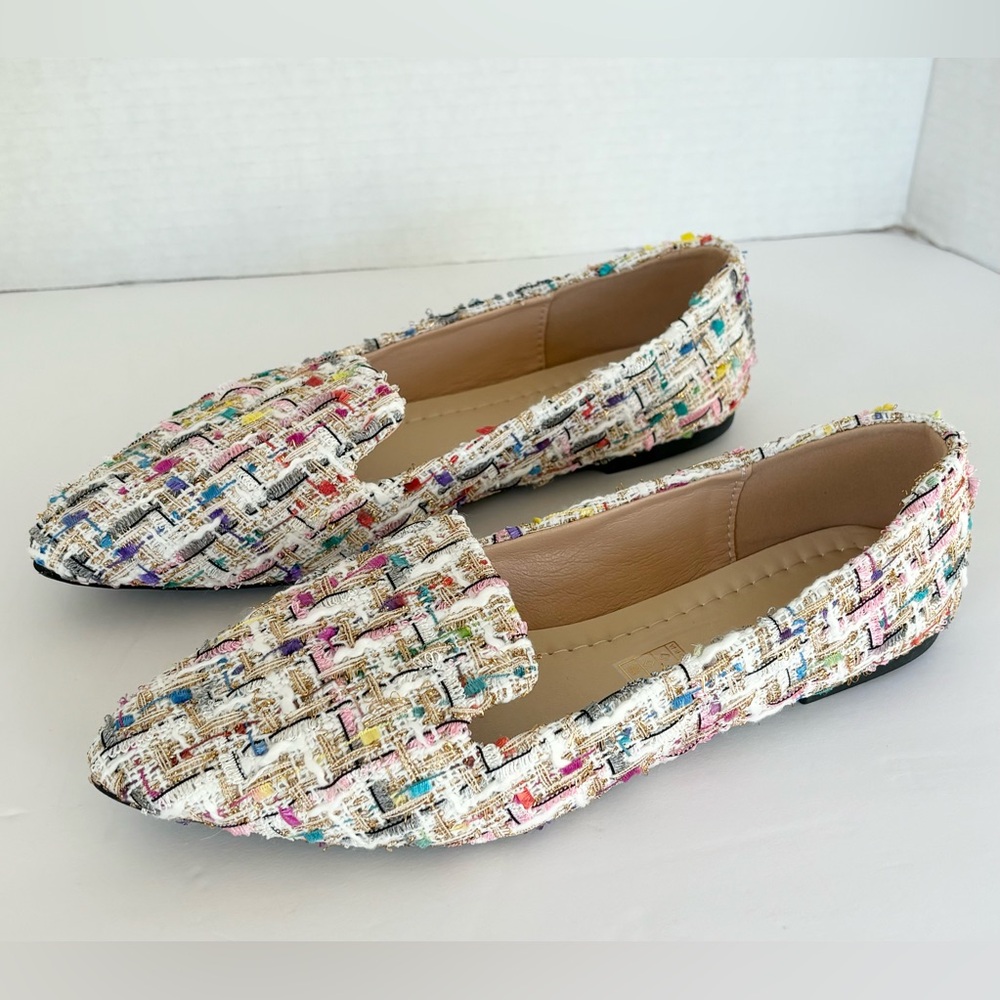 Pastel plaid patterned, pointed toe flat dress shoe.